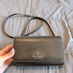 Black Kate spade crossbody purse.